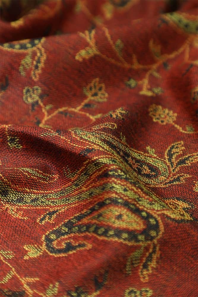 fabric with paisley vine floral pattern and textile texture background