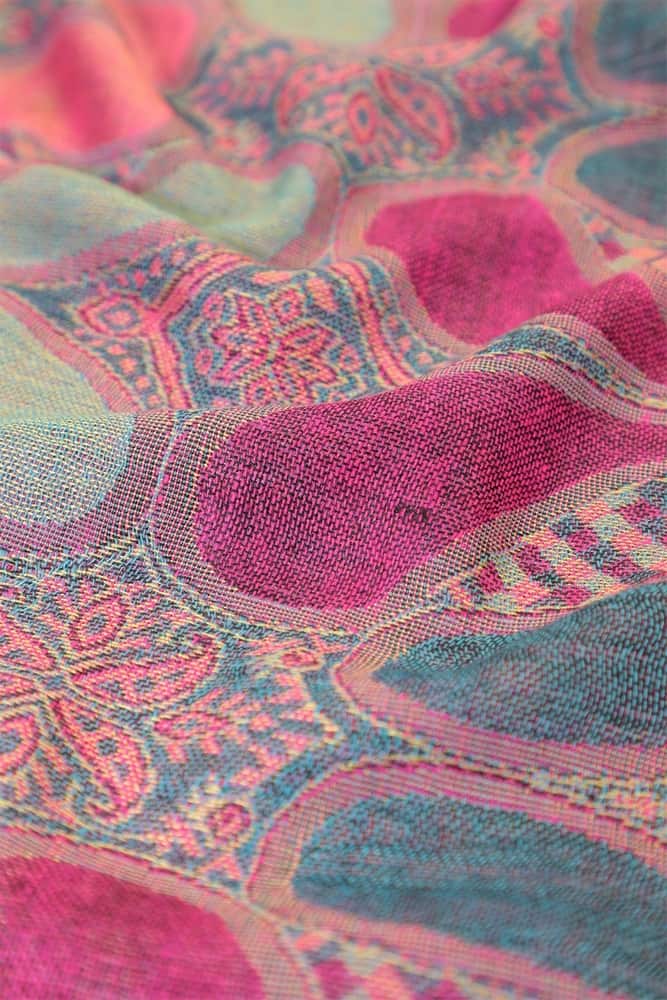 fabric detail of fuchsia multi color paisley pashmina