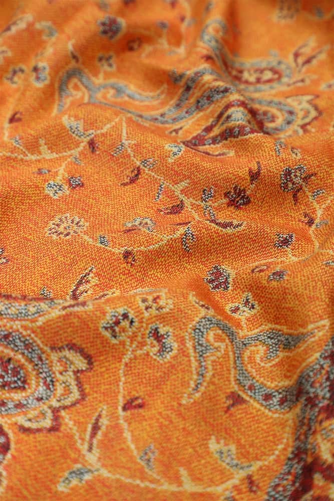 fabric with paisley vine floral pattern and textile texture background